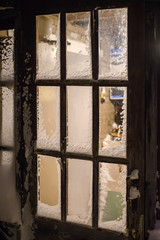 Snow-covered glass door