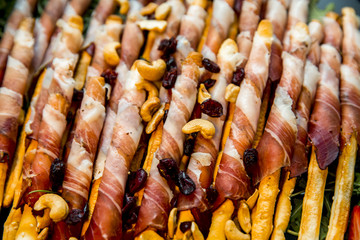Bread sticks grissini with prosciutto
