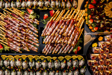 Bread sticks grissini with prosciutto