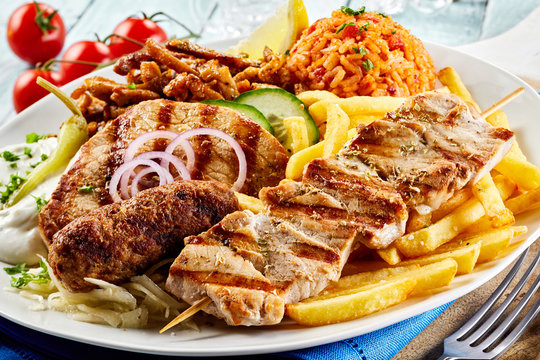 Greek grill plate with assorted meats