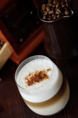 Delicious coffee latte with cinnamon in a glass 