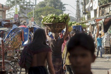 Dhaka / Bangladesh - November 2012: People are working in port of Dhaka during rush hours. - 193196645