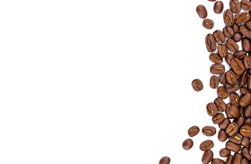 Closeup of coffee beans on white background. Copy space