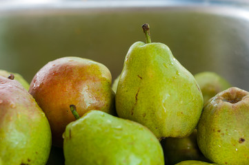 Pear texture: lots of pears collected in a bowl. Pear storage