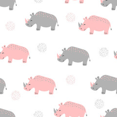 Seamless pattern with cute rhinoceros. Vector childish background for kids design.