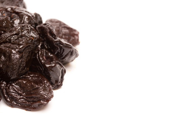 Dried Prunes on a White Background