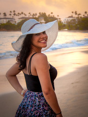 Latina woman on holiday at the beach 5
