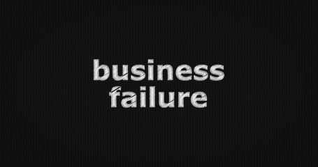 Business failure word on black background.