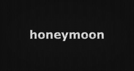 Honeymoon word on black background.