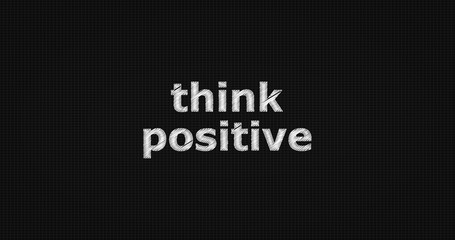 Think positive word on grey background.
