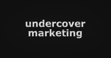 Undercover marketing word on grey background.