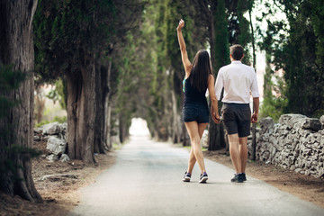 Obraz premium Couple having a walk in nature.Making a company.Stress free,freedom feeling.Happiness and mindfulness.Serene relationship.Soul mates.Best friends hanging out.Deep conversation