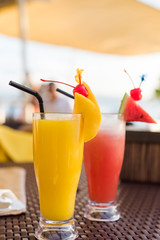 watermelon and pineapple smoothie decorated with slices of watermelon, pineapple Healthy drinks and food concept