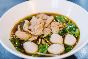Beef noodles with braised beef and meatball delicious Chinese style Asian favorite food.