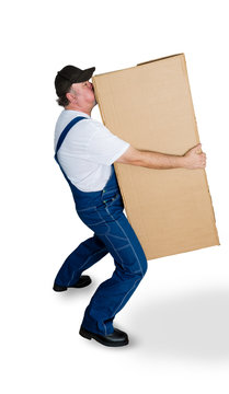 Delivery man carrying heavy cardboard box