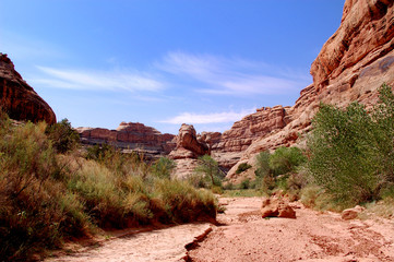 Dry wash and sandstone formations in grand gulch canyon country Southern Utah.