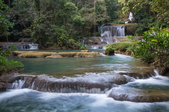 Scenic waterfalls and lush vegetation in Jamaica