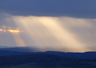 Heavy clouds and sunrays