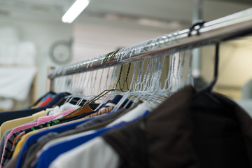 shirts hanging on a hanger.Colorful T Shirt