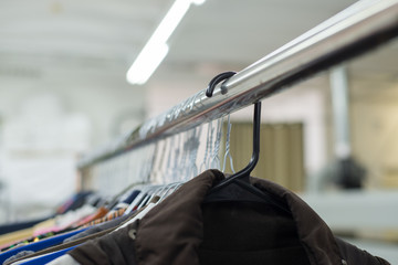 shirts hanging on a hanger.Colorful T Shirt