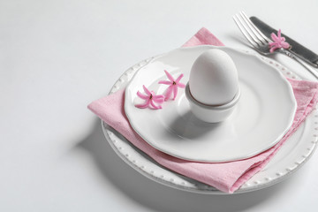 Beautiful festive Easter table setting on white background