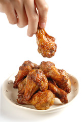  Grilled chicken legs with cumin on white background