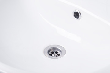 white washbasin in the bathroom close-up view from above