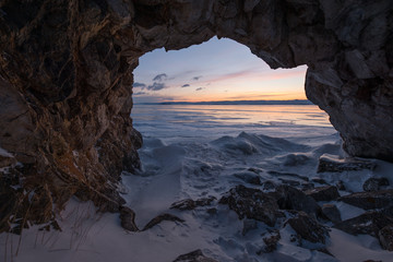 Dawn in the grotto, winter Baikal lake 