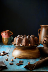 Homemade chocolate cake with nuts. Dark background
