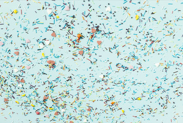 Powder for Easter cakes on a blue background. Texture