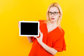 Blonde woman with tablet pc