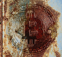 Grunge metal background with symbol of bitcoin