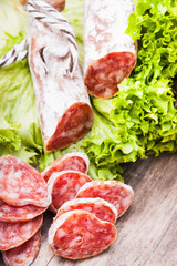 Sausage salami with noble mold and lettuce