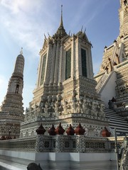 Details of famous Wat Arun buddhist temple, Bangkok, Thailand, East Asia, with its rich decoration, stairs and giants. daylight, outdoor, tourism industry, religion, buddhism