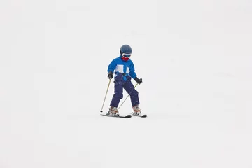 Wandaufkleber Chidren skiing under the snow. Winter sport. Ski slope © h368k742