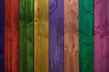 Multicolored wooden slats texture background, close-up