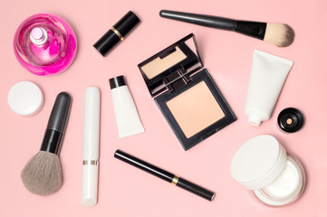 Concept of a white and black cosmetic supplies. Top view on pink background - 193248201
