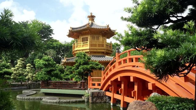 panning shot of nan lian gardens, bridge and pavilion in hong kong, china