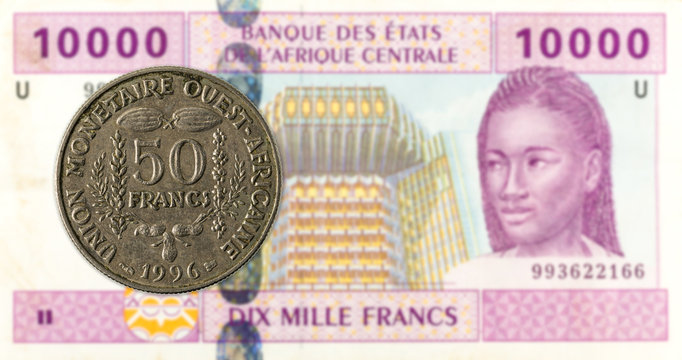 50 central african CFA franc coin against 10000 central african CFA franc bank note obverse