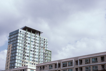 Fototapeta premium image of condo building and blue sky background.