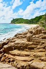 beautiful paradise beach anse bazarca. white sand,turquoise water,palm trees, granite rocks, seychelles