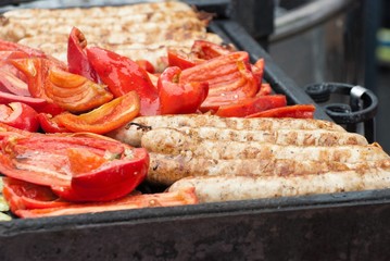 Fried, on the grill, vegetable and meat sausages.