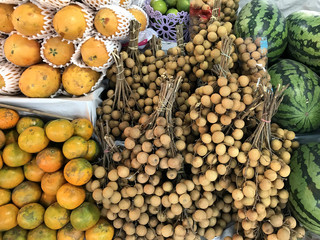 Fresh fruits texture background. Street market in Thailand.