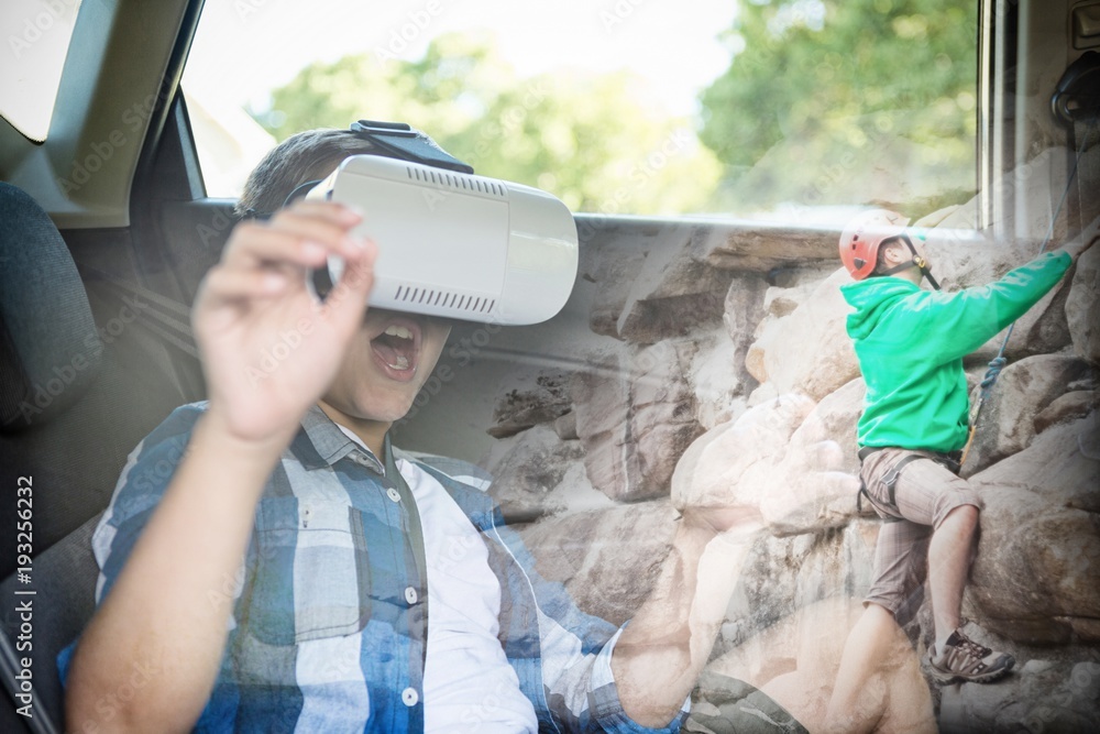 Poster composite image of boy using virtual reality headset