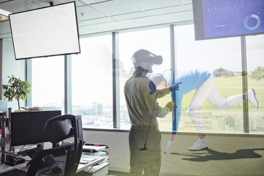 Composite image of business using virtual reality headset by