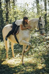 Foto op Canvas Girl and horse in the woods © keleny