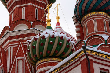 Fototapeta na wymiar Details and domes of Moscow Saint Basil Cathedral