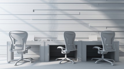 Three chairs standing by workstation
