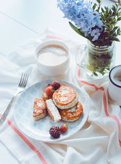 syrniki with poppy seeds on a wooden surface. concept of a healthy breakfast