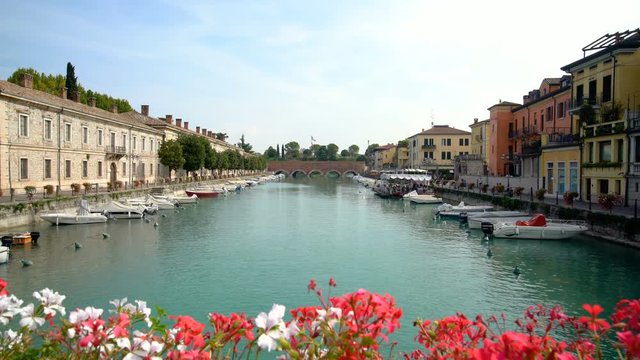 Port of Peschiera del Garda - town and commune near Venice , Italy .